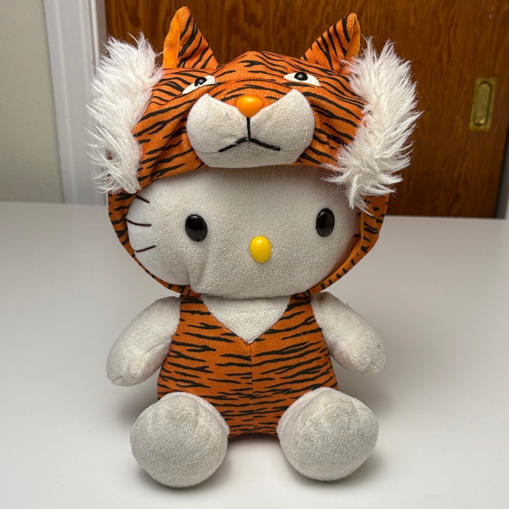 Vintage Y2K Sanrio Hello Kitty wearing Lion Costume Plush Stuffed animal